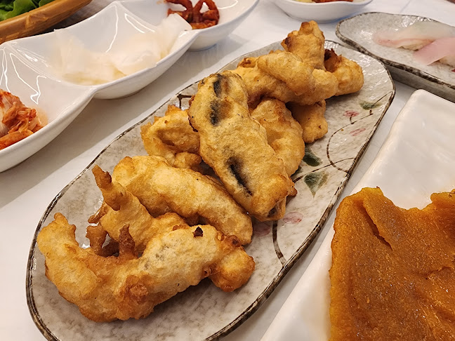 Opinii despre 성산포자연산회센타 în 서귀포시 - 외식업