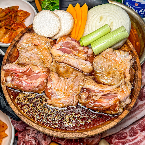 Opinii despre 제주산숯불구이 함덕 흑돼지 한우 Black Pork Jeju Beef and Chicken în 제주시 - 외식업